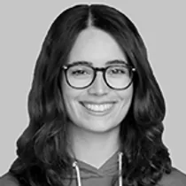 Black-and-white staff profile section featuring headshots of Ana Guerra.