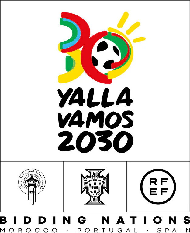 Official “Yalla Vamos 2030” logo featuring a stylized red, green, and yellow graphic forming the number 2030 with a soccer ball, above the text “Yalla Vamos 2030.” Below are the football federation logos of Morocco, Portugal, and Spain with the caption “Bidding Nations – Morocco · Portugal · Spain.”