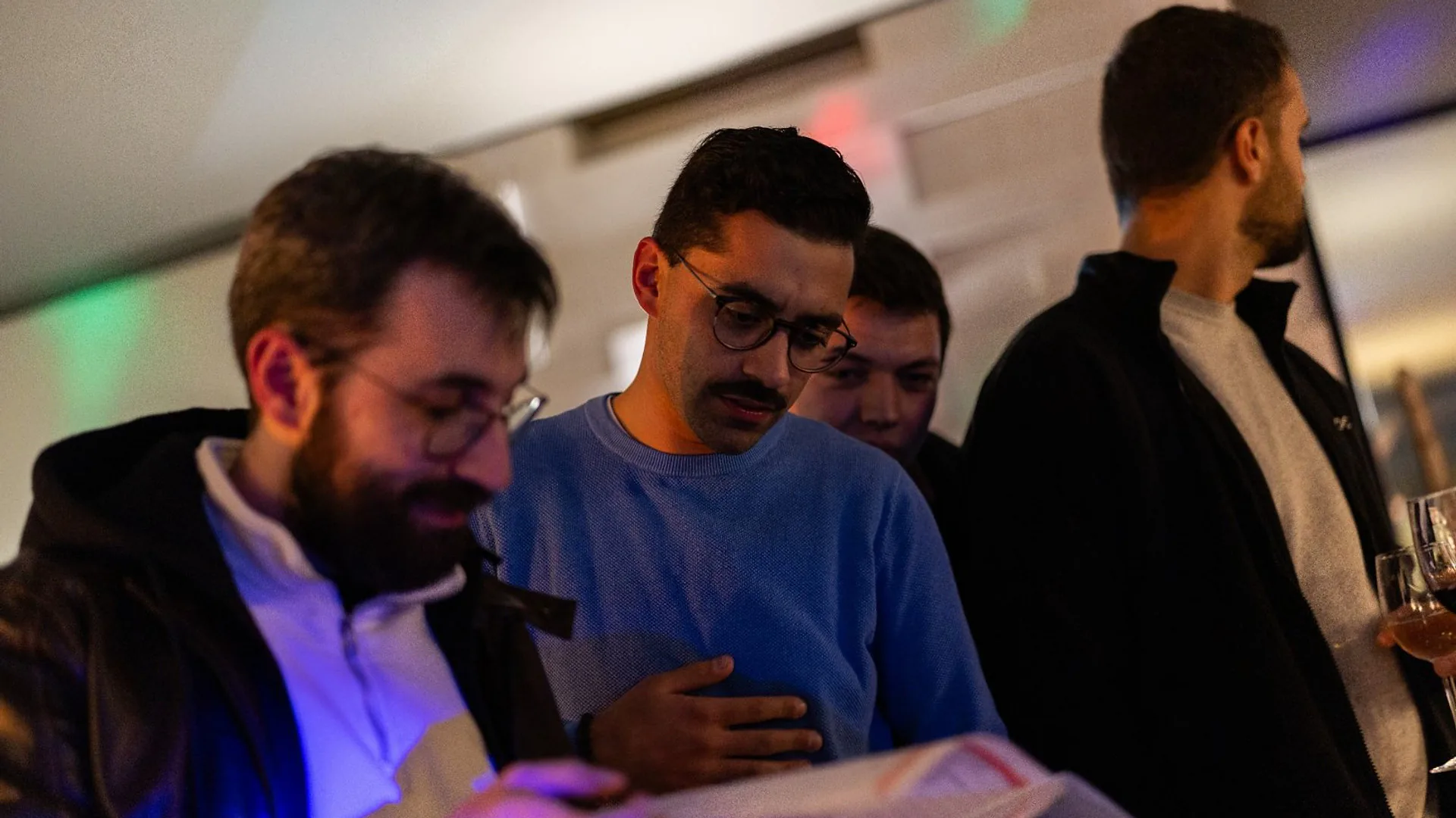 Man presenting beside a screen with a “City as a Platform” slide, gesturing with his hands while speaking.