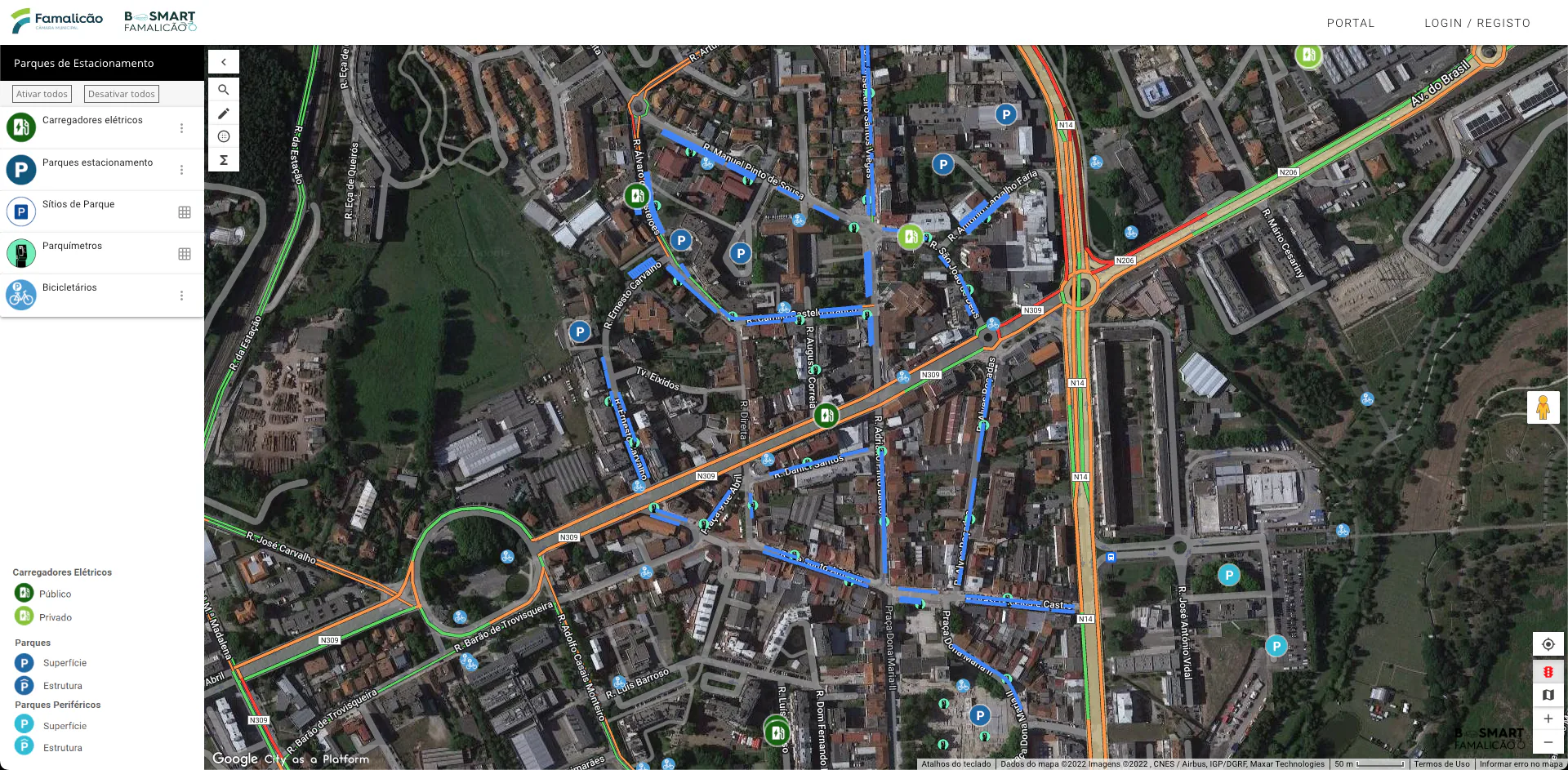 Satellite view of Vila Nova de Famalicão displaying parking zones, electric vehicle charging stations, and mobility infrastructure.